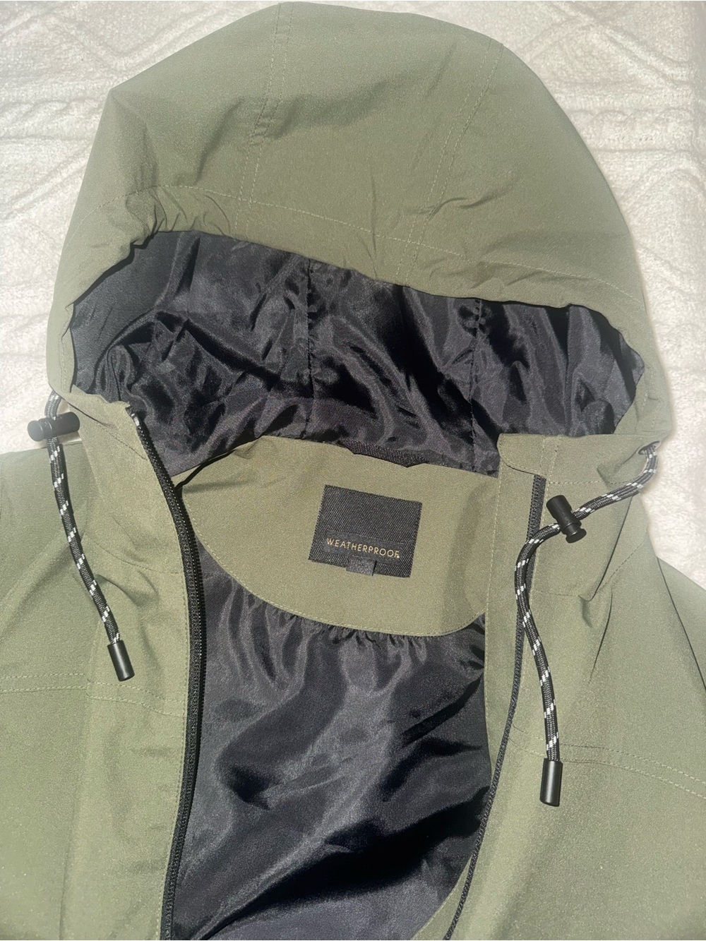 Weatherproof Women’s Hooded Raincoat in Olive Green with Black Lining